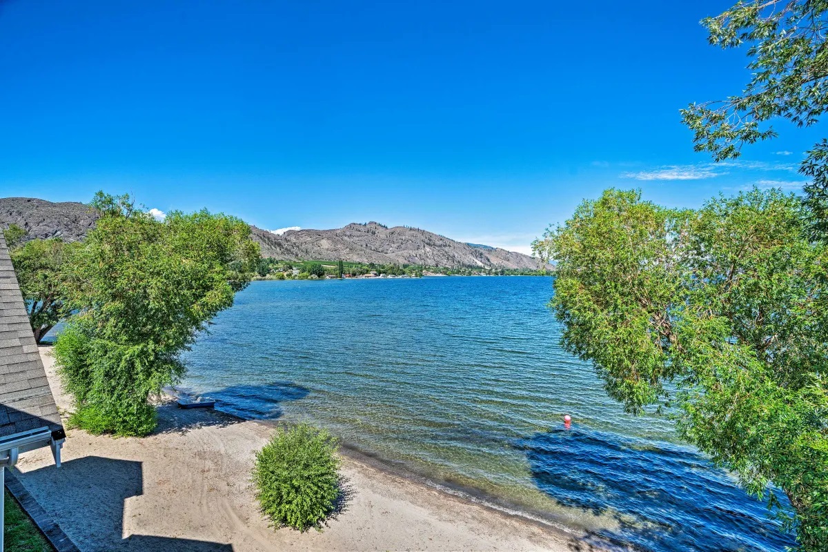 Sandy beach and Lake Osoyoos from the townhome